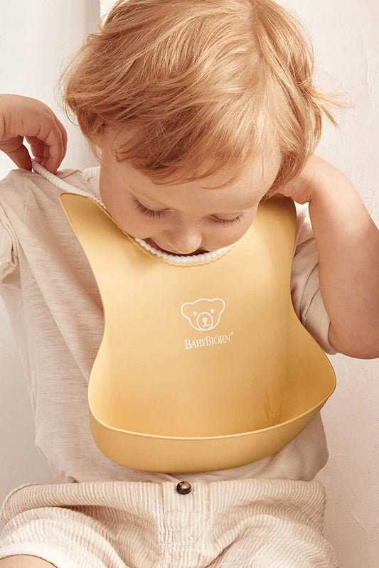 BABYBJORN silikónové podbradníky s vreckom x2