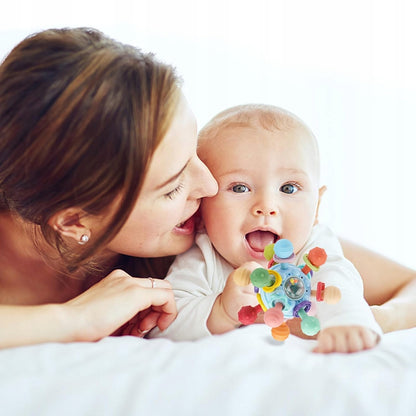 VORENUS Spinning Ball senzorická loptička a hryzadlo 11 cm