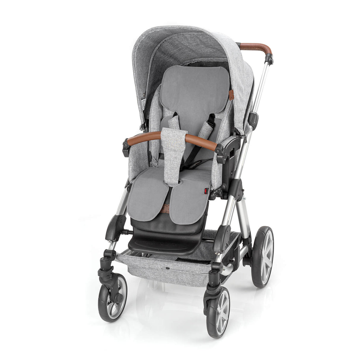 Szara wk�adka Reer TravelKid Breeze na siedzisku szarego w�zka.