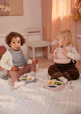 BABYBJORN silikónové podbradníky s vreckom x2