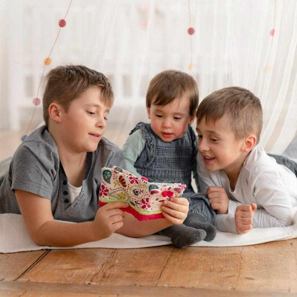 FEHN książeczka sensoryczna z lusterkiem ZAWIESZKA