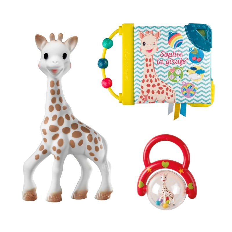 Gryzak Sophie la girafe, kolorowa książeczka i czerwona grzechotka przedstawione na białym tle.
